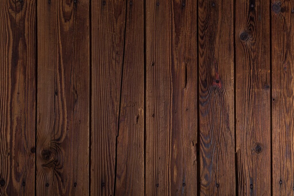 comparison of deet spray and natural diy repellent on wooden surface