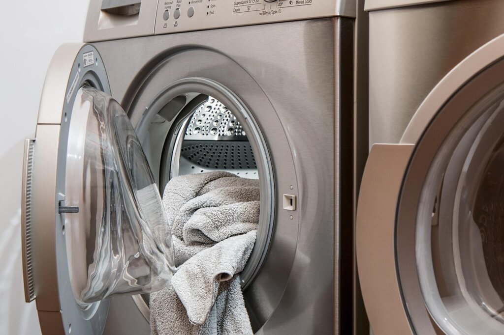 dirty washing machine detergent drawer with residue