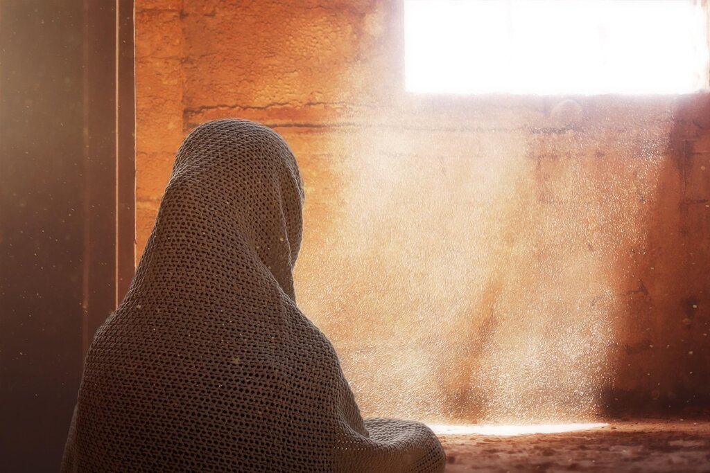 fabric sofa with dust particles visible in sunlight