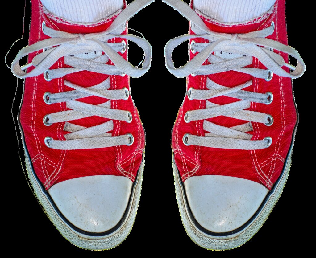 white sneakers stored in clear box with silica gel packet