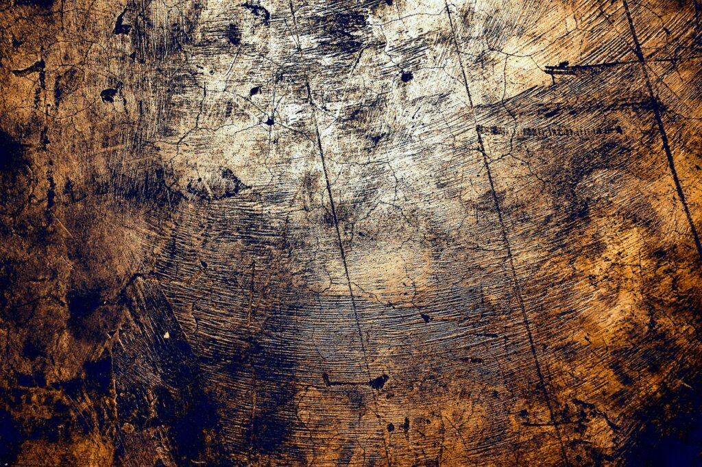 cracked leather sofa surface close up sunlight damage