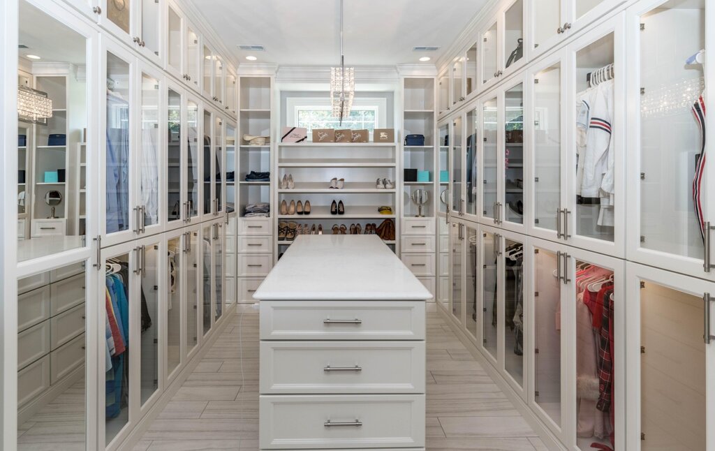 open closet with good ventilation and organized clothes