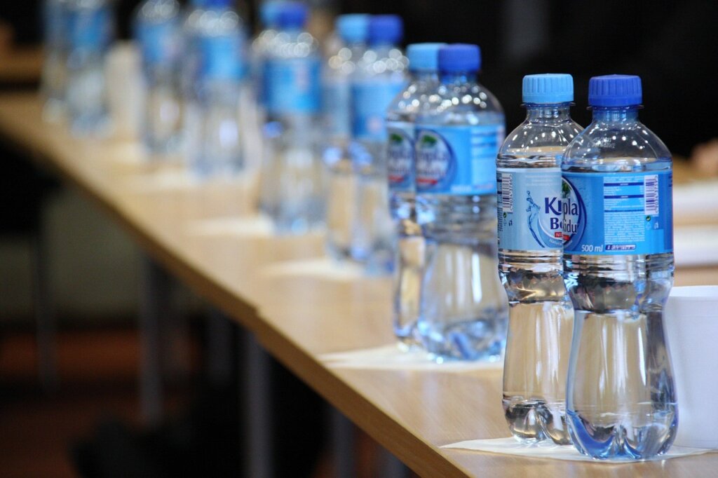 plastic bottle label peeling off under running water