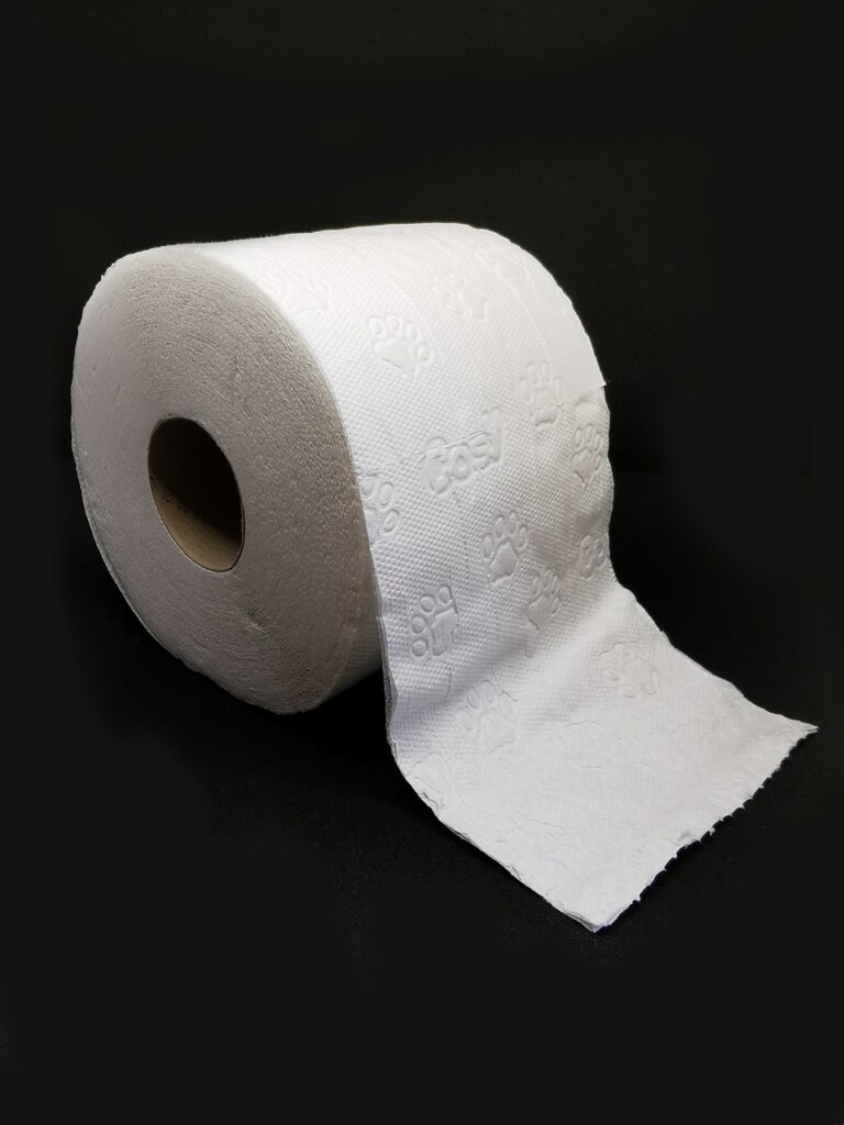 white vinegar soaked paper towel wrapped around toilet stain