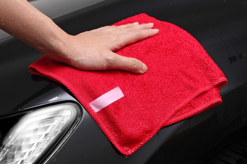 microfiber cloth wiping refrigerator door seal weekly maintenance