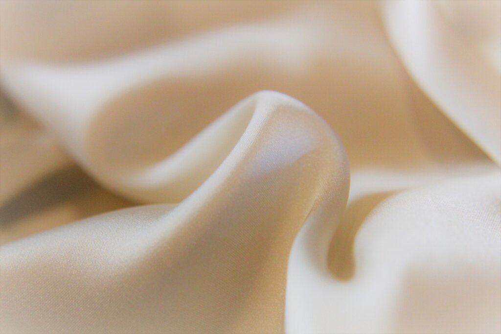 different types of kitchen cloths laid out on white surface, cotton and microfiber