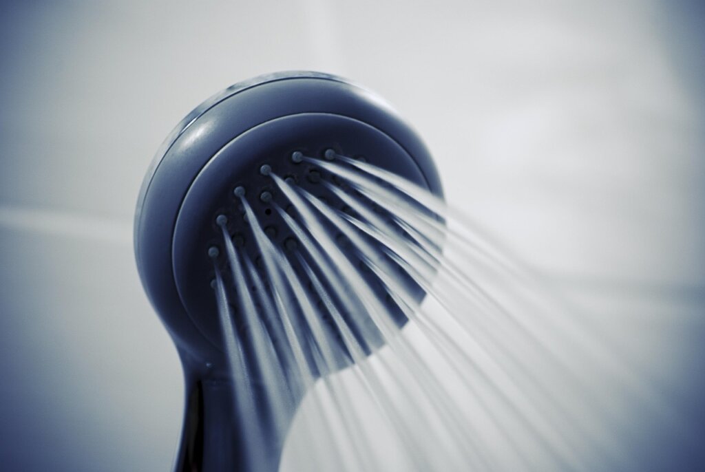before and after showerhead water spray comparison
